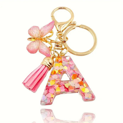Personalised Resin Letter Keychain – Floral Design with Tassel & Charm