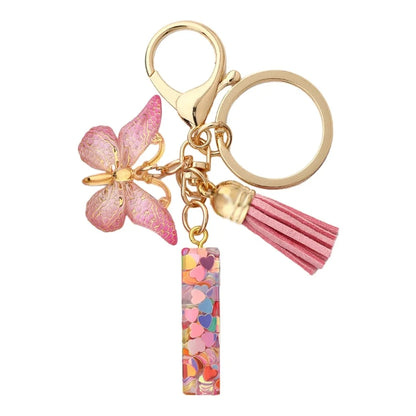 Personalised Resin Letter Keychain – Floral Design with Tassel & Charm